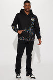 https://cdn.shopify.com/s/files/1/0293/9277/files/02-17-23Studio5_ID_DJ_10-23-20_16_ChileHoodie_Black_6615.jpg?v=1728932659