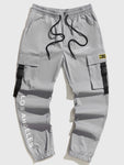 Manfinity EMRG Men Slogan Graphic Patched Detail Flap Pocket Buckled Drawstring Waist Joggers - MapleCo