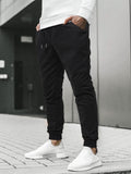 Manfinity Hypemode Loose Fit Men's Sweatpants With Slant Pockets And Drawstring Waist Long Sweat Pant Plain Black Basic - MapleCo