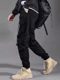 Manfinity EMRG Men Slogan Graphic Buckle Detail Flap Pocket Drawstring Waist Cargo Pants - MapleCo