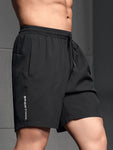 Manfinity Fitness Men Letter Graphic Drawstring Waist Sports Stretchy Shorts Gym Shorts