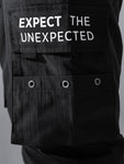 Manfinity Hypemode Loose Fit Men's Slogan Graphic Cargo Pants With Grommet Detail, Flap Pockets, And Drawstring Closure - MapleCo