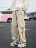 Manfinity Hypemode Loose Fit Men's Cargo Pants With Flap Pockets Side Drawstring Waist Baggy Long Plain Khaki Going Out