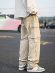 Manfinity Hypemode Loose Fit Men's Cargo Pants With Flap Pockets Side Drawstring Waist Baggy Long Plain Khaki Going Out