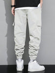 Manfinity Hypemode Loose Fit Men's Cargo Pants With Letter Graphic, Flap Pockets And Drawstring Waist