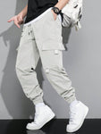 Manfinity Hypemode Loose Fit Men's Cargo Pants With Letter Graphic, Flap Pockets And Drawstring Waist