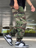 Manfinity Hypemode Loose Fit Men's Camouflage Print Cargo Pants With Flap Pockets Baggy Long Camo Graphic Army Green Going Out