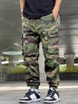 Manfinity Hypemode Loose Fit Men's Camouflage Print Cargo Pants With Flap Pockets Baggy Long Camo Graphic Army Green Going Out