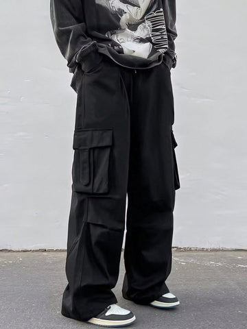 Manfinity EMRG Men Flap Pocket Side Drawstring Waist Oversize Cargo Pants Baggy Long Plain Black Going Out