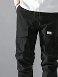 Manfinity Hypemode Loose Fit Men's Cargo Pants With Letter Patching, Flap Pockets, And Drawstring Waist - MapleCo