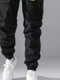 Manfinity Hypemode Loose Fit Men's Cargo Pants With Letter Patching, Flap Pockets, And Drawstring Waist - MapleCo