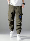 Manfinity Homme Loose-Fit Men's Cargo Pants With Letter Patches, Flap Pockets And Drawstring Waist - MapleCo