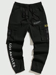 Manfinity EMRG Men Slogan Graphic Flap Pocket Buckle Detail Cargo Pants