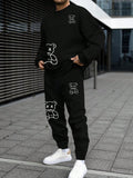 Manfinity Men's Cartoon Printed Fleece Sweatshirt And Pants Set