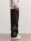 Manfinity Hypemode Loose-Fit Men's Star Pattern Side Stripe Pants - MapleCo