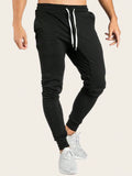 Manfinity Sporsity Men Loose Drawstring Waist Side Tape Sweatpants