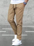 Manfinity Basics Men Solid Drawstring Waist Pants