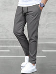 Manfinity Basics Men Solid Drawstring Waist Pants