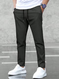 Manfinity Basics Men Solid Drawstring Waist Pants