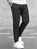 Manfinity Basics Men Solid Drawstring Waist Pants