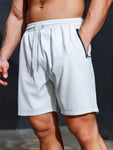 Sport Men Letter Graphic Zipper Pocket Sports Stretchy Shorts - MapleCo