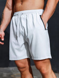 Sport Men Letter Graphic Zipper Pocket Sports Stretchy Shorts - MapleCo