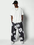 SUMWON Loose Fit Baggy Joggers With All Over Print