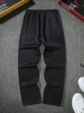 Manfinity Hypemode Men's Loose Solid Color Drawstring Black Sweatpants