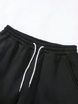 Manfinity Hypemode Men's Loose Solid Color Drawstring Black Sweatpants