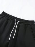 Manfinity Hypemode Men's Loose Solid Color Drawstring Black Sweatpants