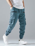 Manfinity Loose Fit Men Cargo Pants With Flap Pockets, Side Drawstring Waist