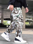 Manfinity Hypemode Loose Fit Men's Camouflage Print Cargo Pants With Flap Pockets Baggy Long Camo Graphic Army Green Going Out