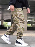 Manfinity Hypemode Loose Fit Men's Camouflage Print Cargo Pants With Flap Pockets Baggy Long Camo Graphic Army Green Going Out