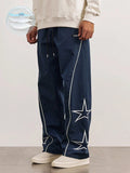 Manfinity Hypemode Men Loose Embroidery Star Pattern Contrast Piping Pants