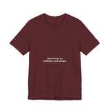 Surviving on caffeine and chaos. - Premium Tee