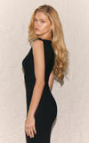 https://cdn-img.prettylittlething.com/8/7/e/3/87e382f5b489ca752246b25d3e507e3458cd6396_CNL6042_4_black_basic_knit_asymmetric_twist_sleeve_maxi_dress.jpg