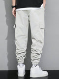 Manfinity Hypemode Loose Fit Men's Cargo Pants With Letter Graphic, Flap Pockets And Drawstring Waist - MapleCo